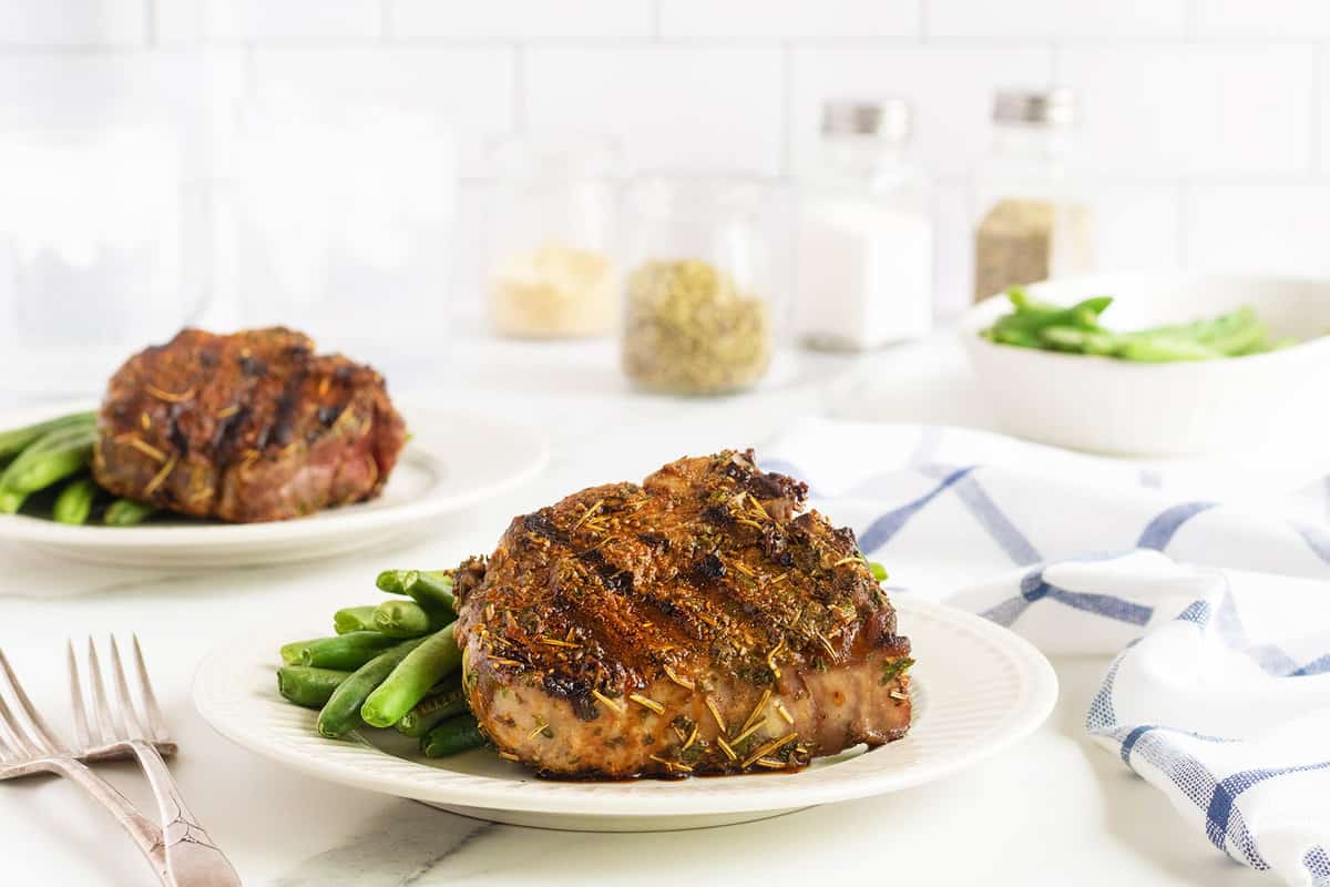 Char-grilled lamb chops with herbs.