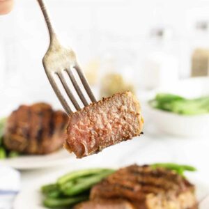 Grilled lamb chops slice on a fork