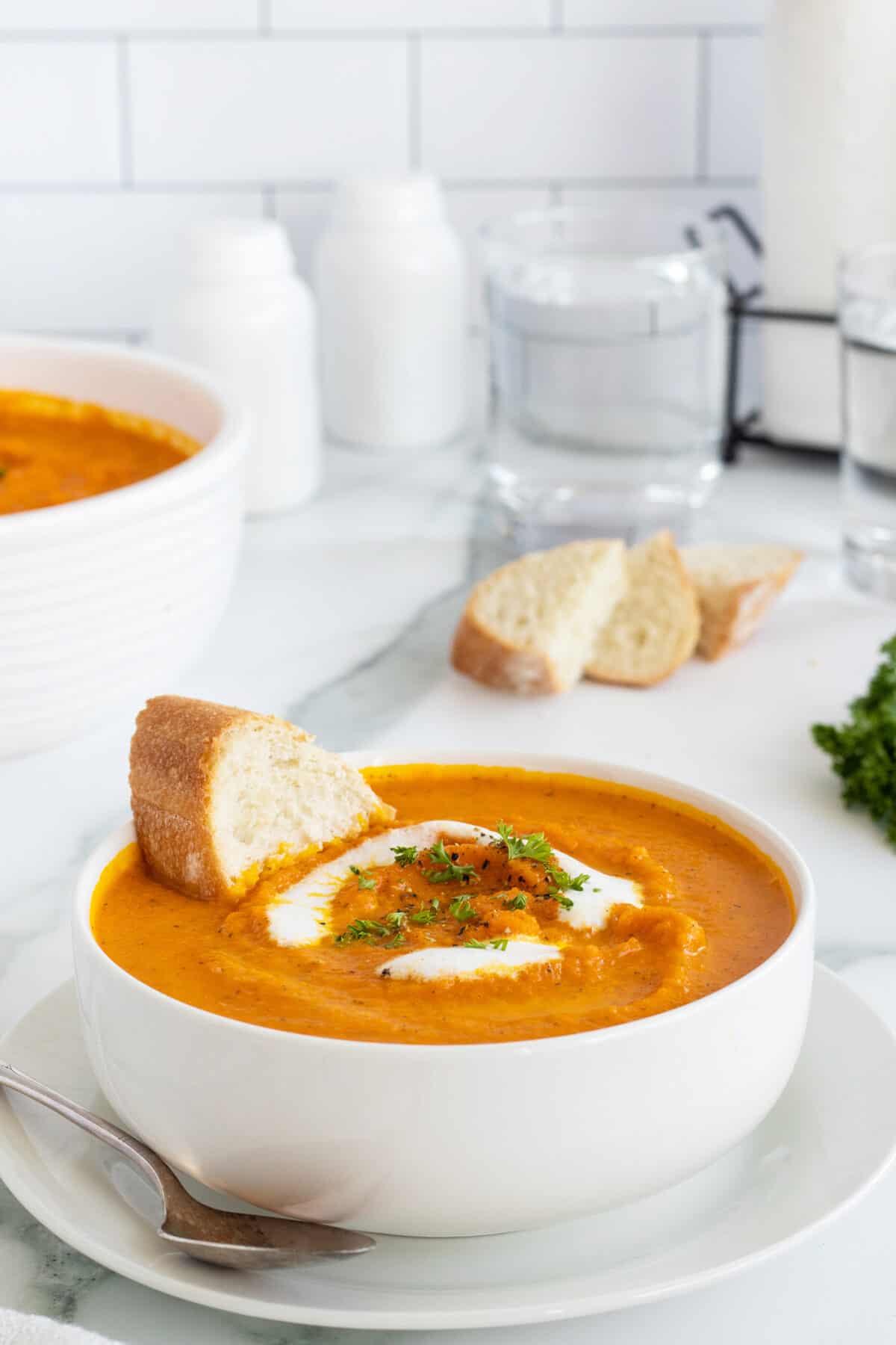 Roasted Carrot Soup with bread in the soup