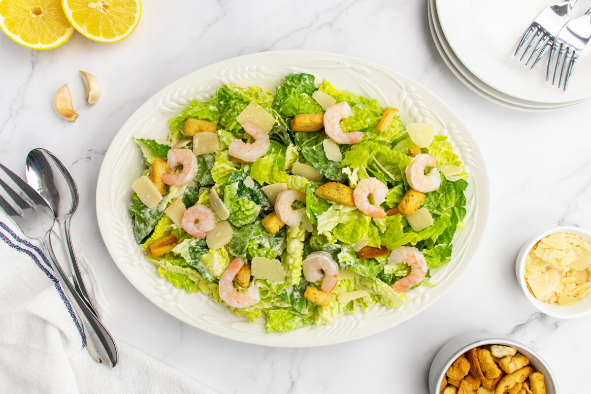 Shrimp Caesar Salad on a white platter