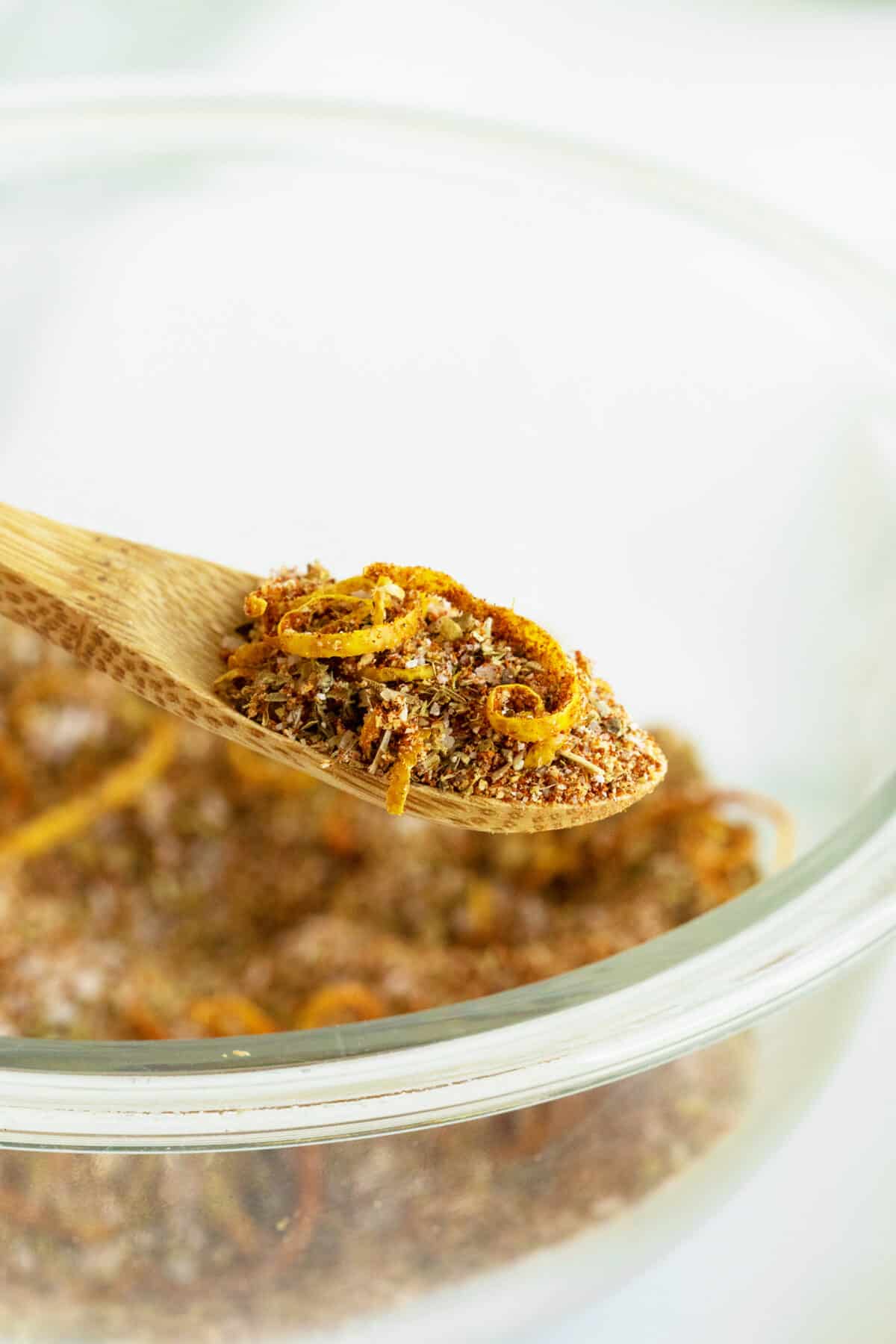 closeup on fish seasoning on a wooden spoon