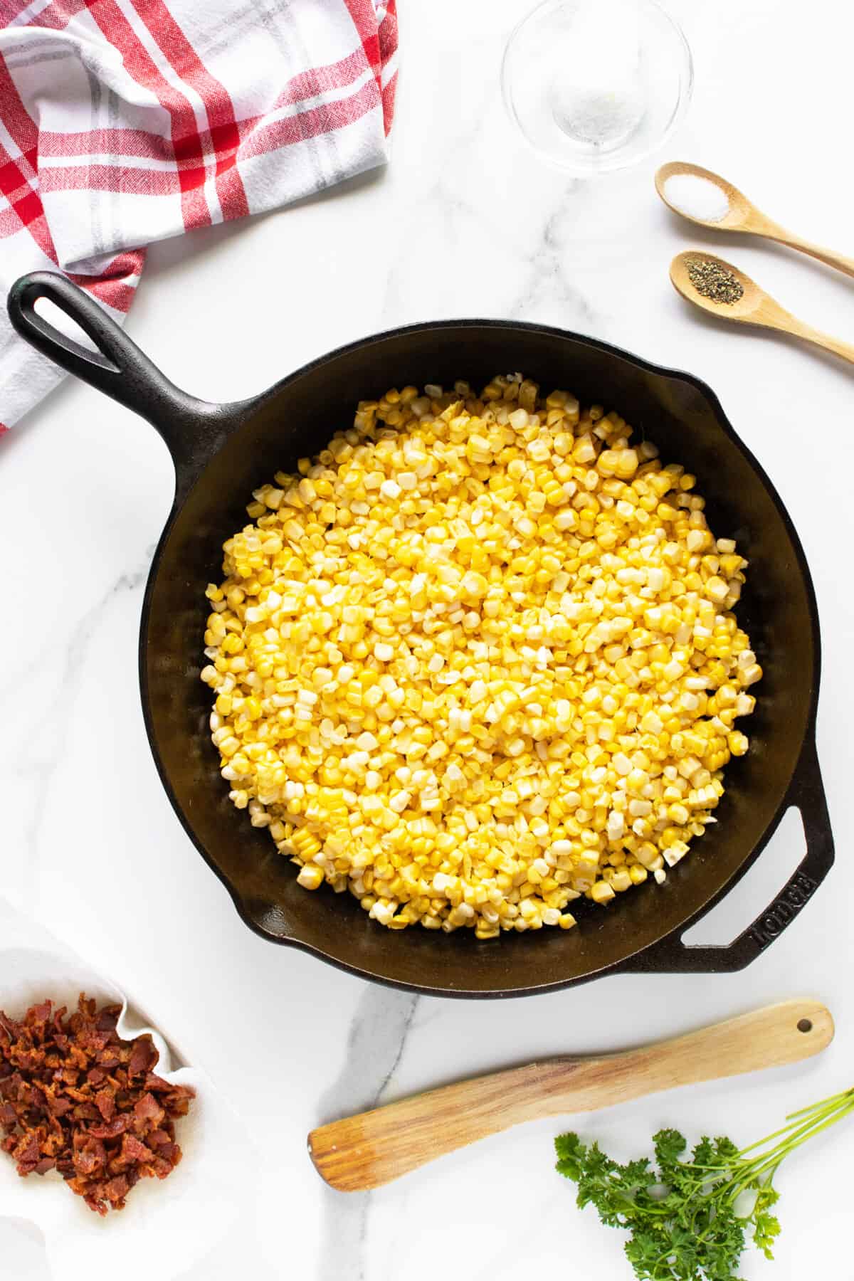 fried corn in a skillet being prepared