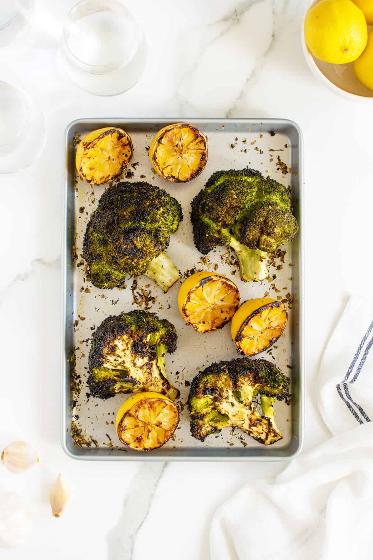 grilled broccoli on a sheet pan