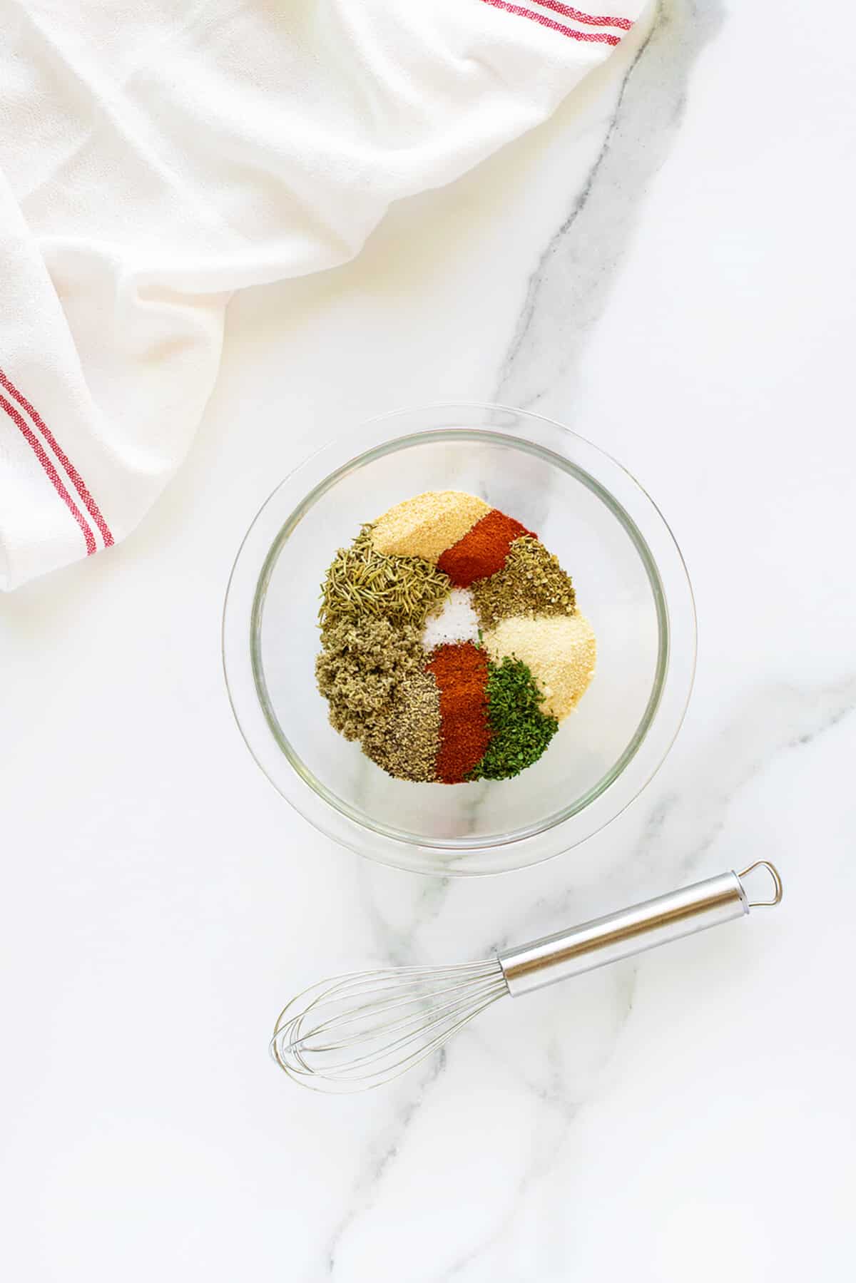 Lamb Seasoning spices in a clear mixing bowl