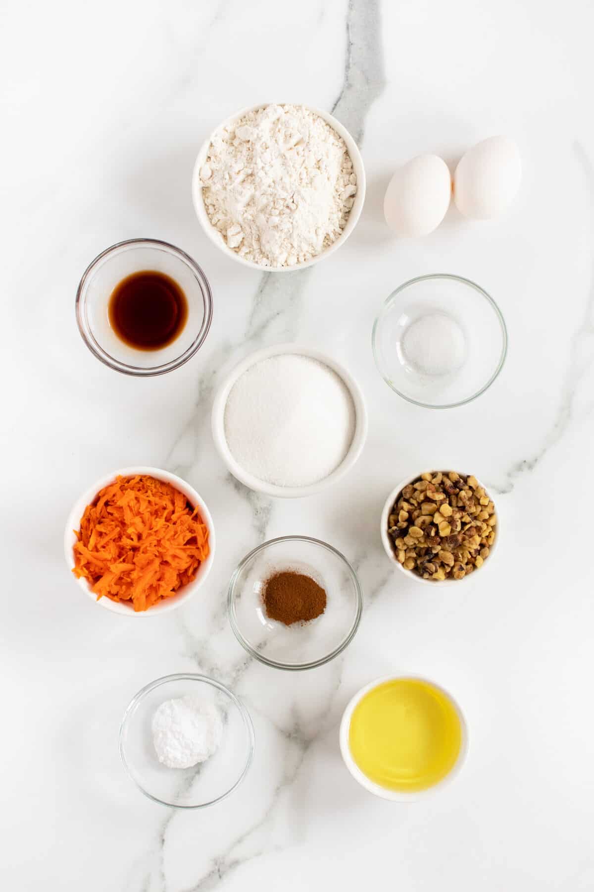 Carrot Cake Muffins ingredients in small bowls
