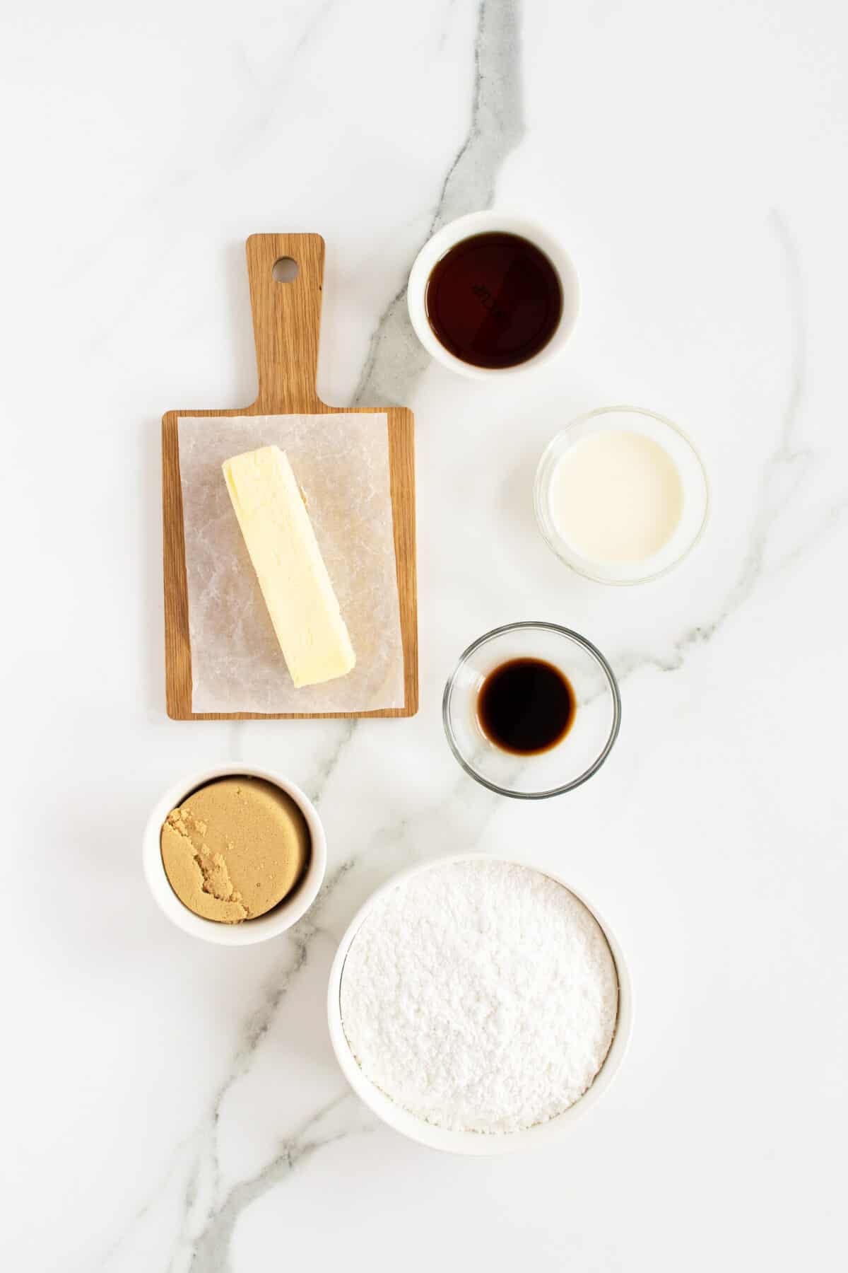 maple frosting ingredients in small bowls