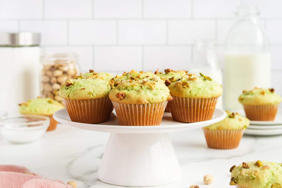 Pistachio Muffins on a cake stand