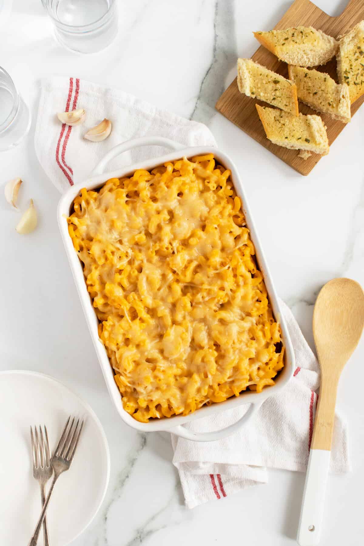 mac and cheese lasagna in a white baking pan