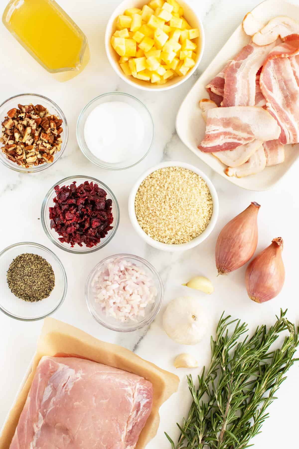 stuffed pork loin ingredients in small white bowls