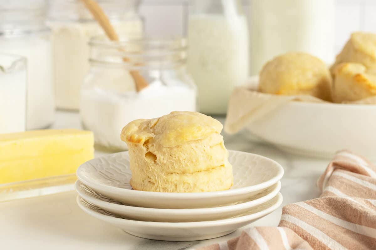 Buttermilk biscuit on a small white plate