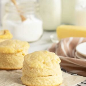 one Buttermilk Biscuit on parchment paper