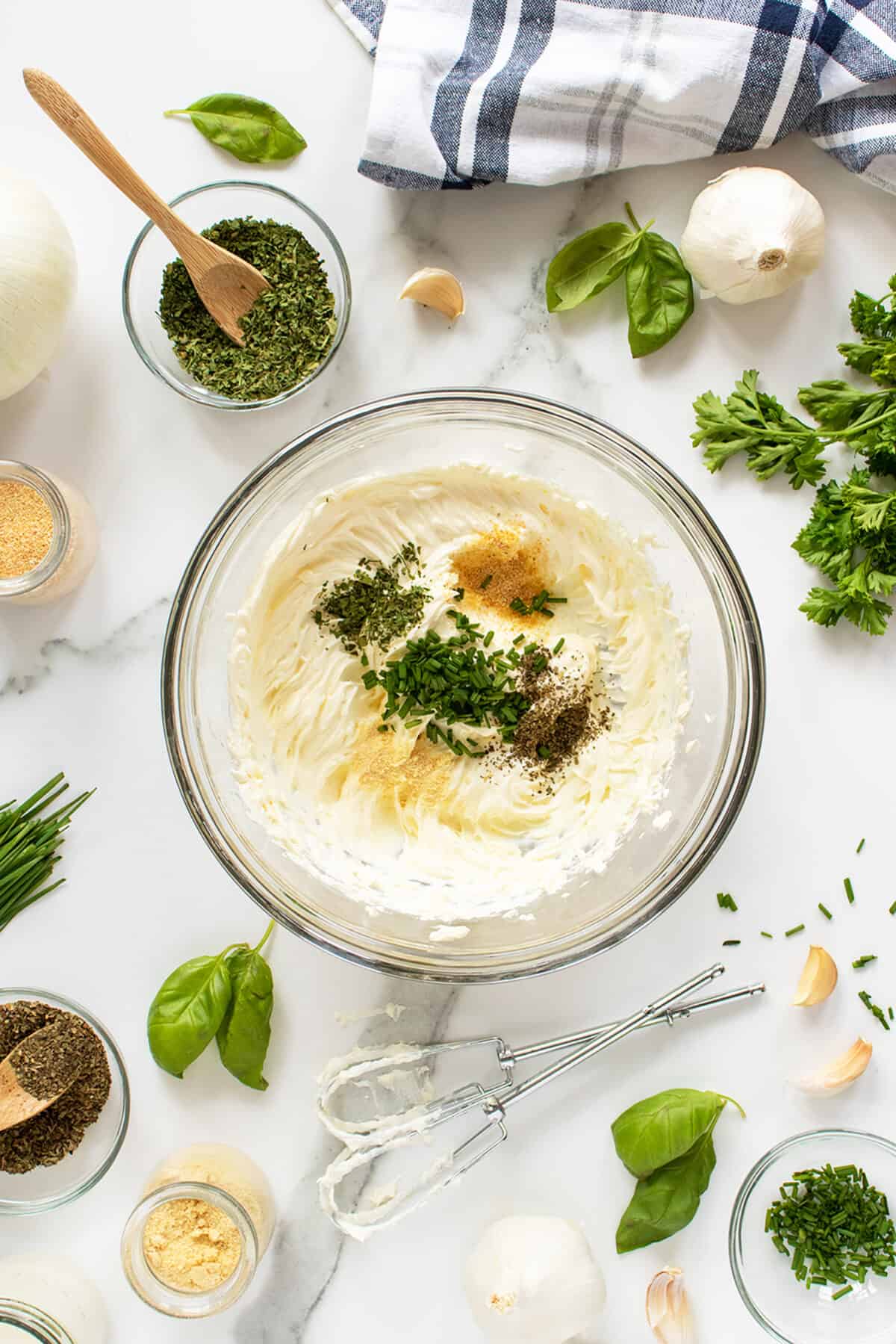 whipped cream cheese  ingredients in a mixing bowl unstirred