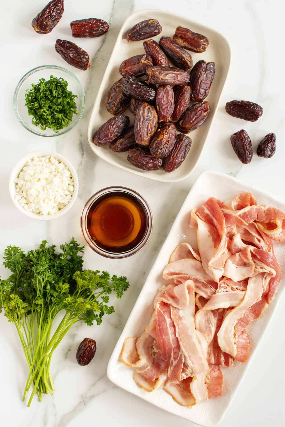 bacon wrapped dates ingredients set out in small bowls