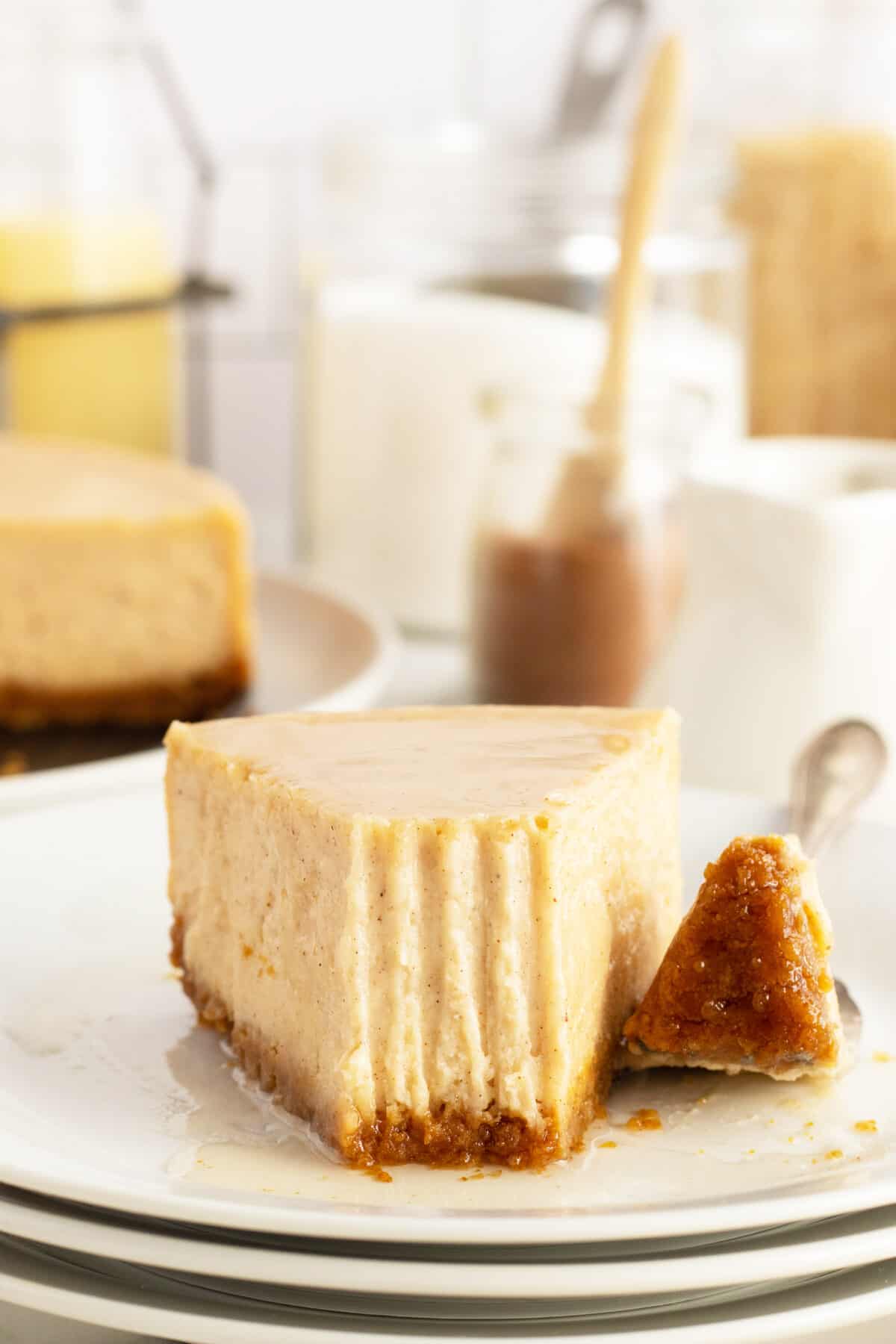 eggnog cheesecake slice with bit on a fork