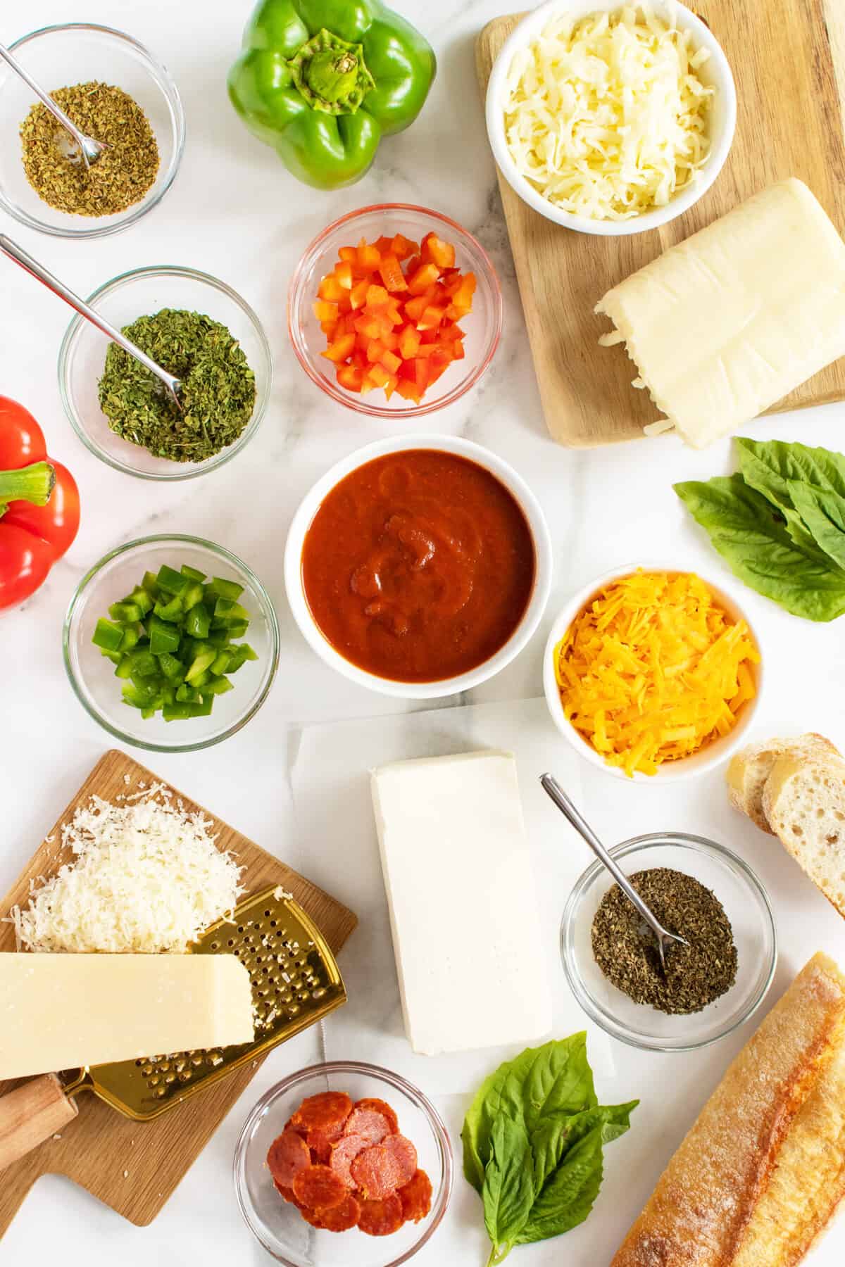 Pizza Dip ingredients in small bowls