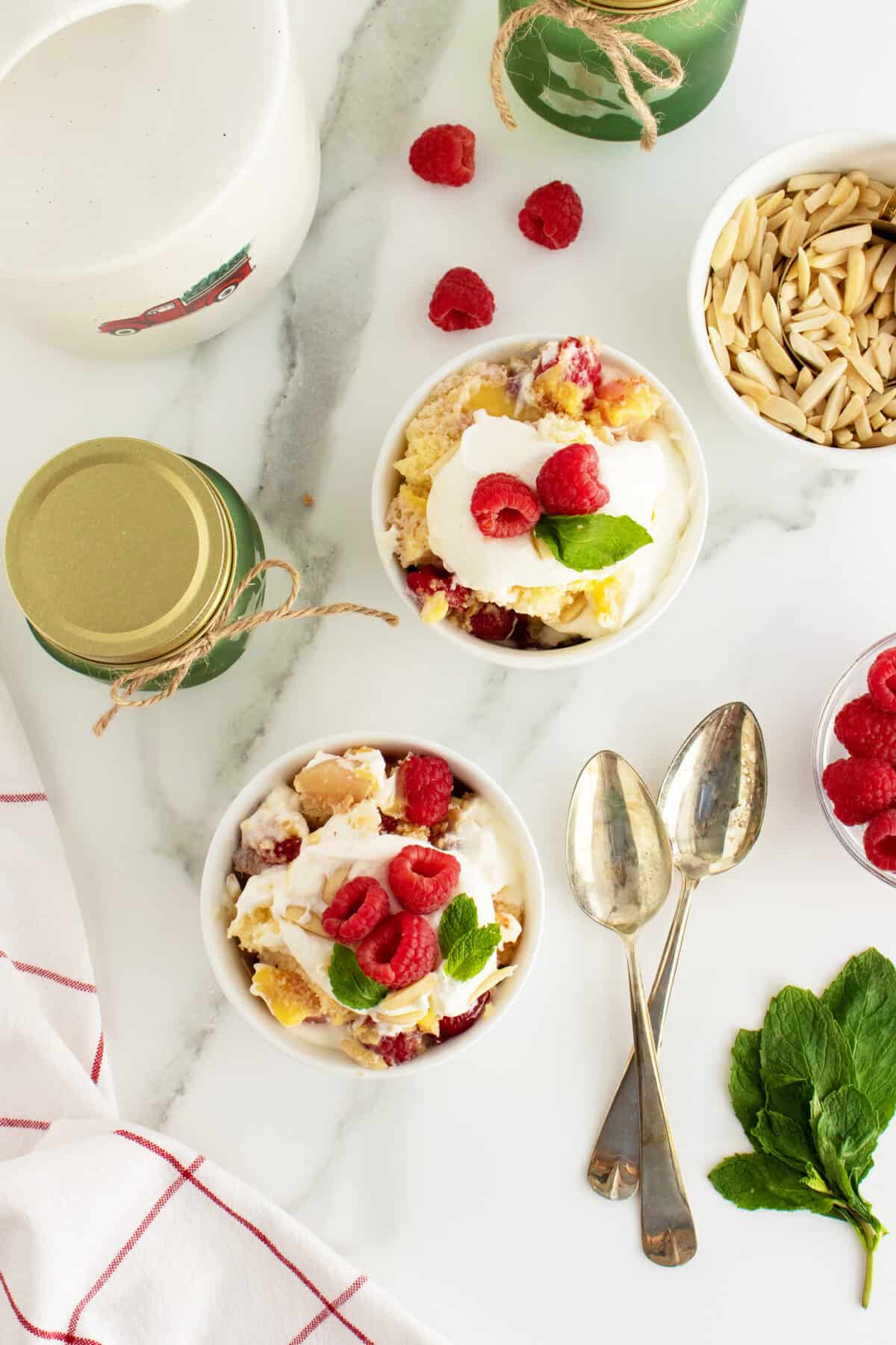 English Christmas Trifle served in two white bowls overhead view