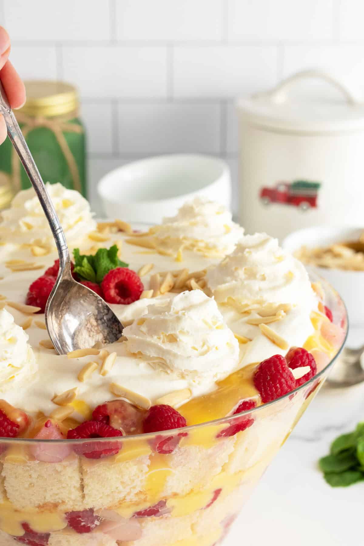 English Christmas Trifle with a spoon in the top of the trifle bowl