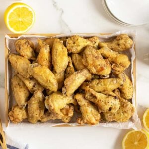 lemon pepper wings on a baking sheet