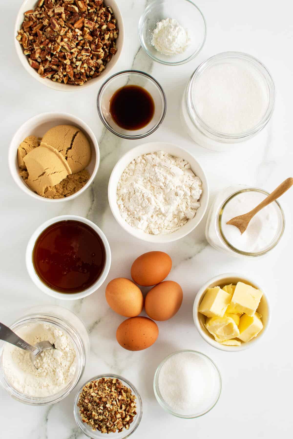 pecan pie bars ingredients in small white bowls