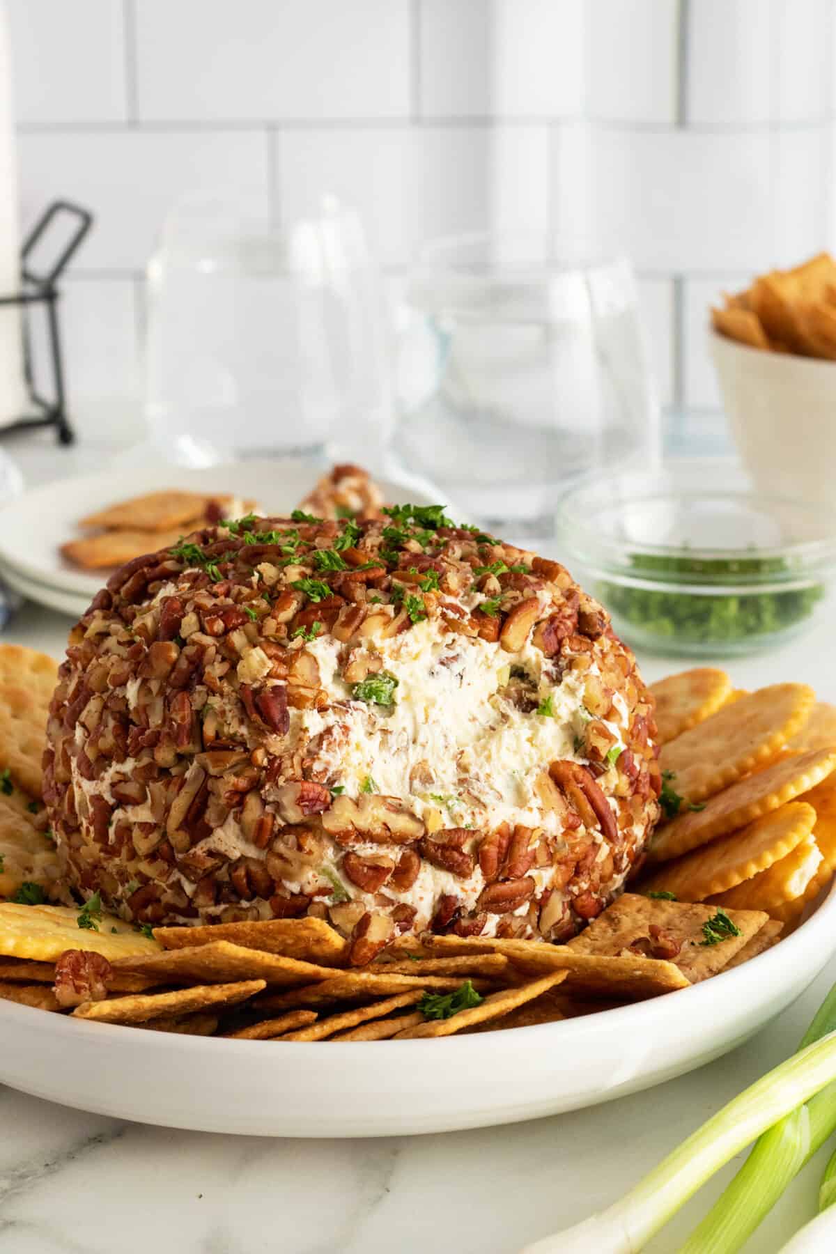 pineapple cheese ball with a scoop taken out