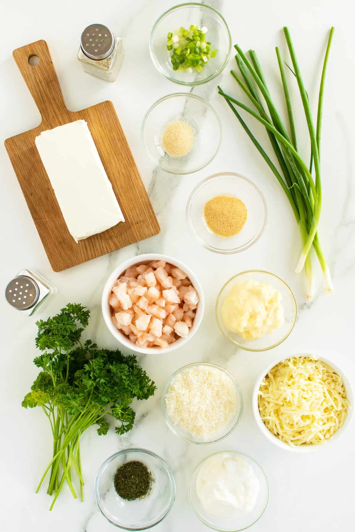 Shrimp dip ingredients in small bowls