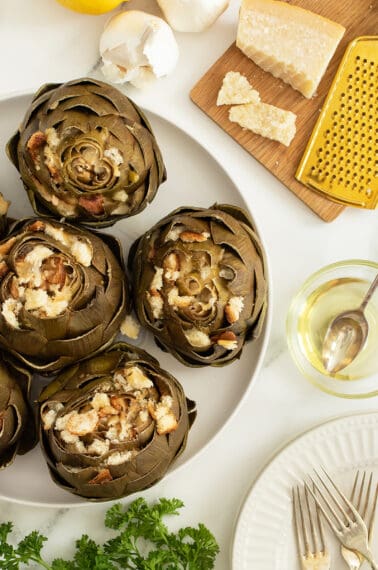 Stuffed Artichokes on a white plate