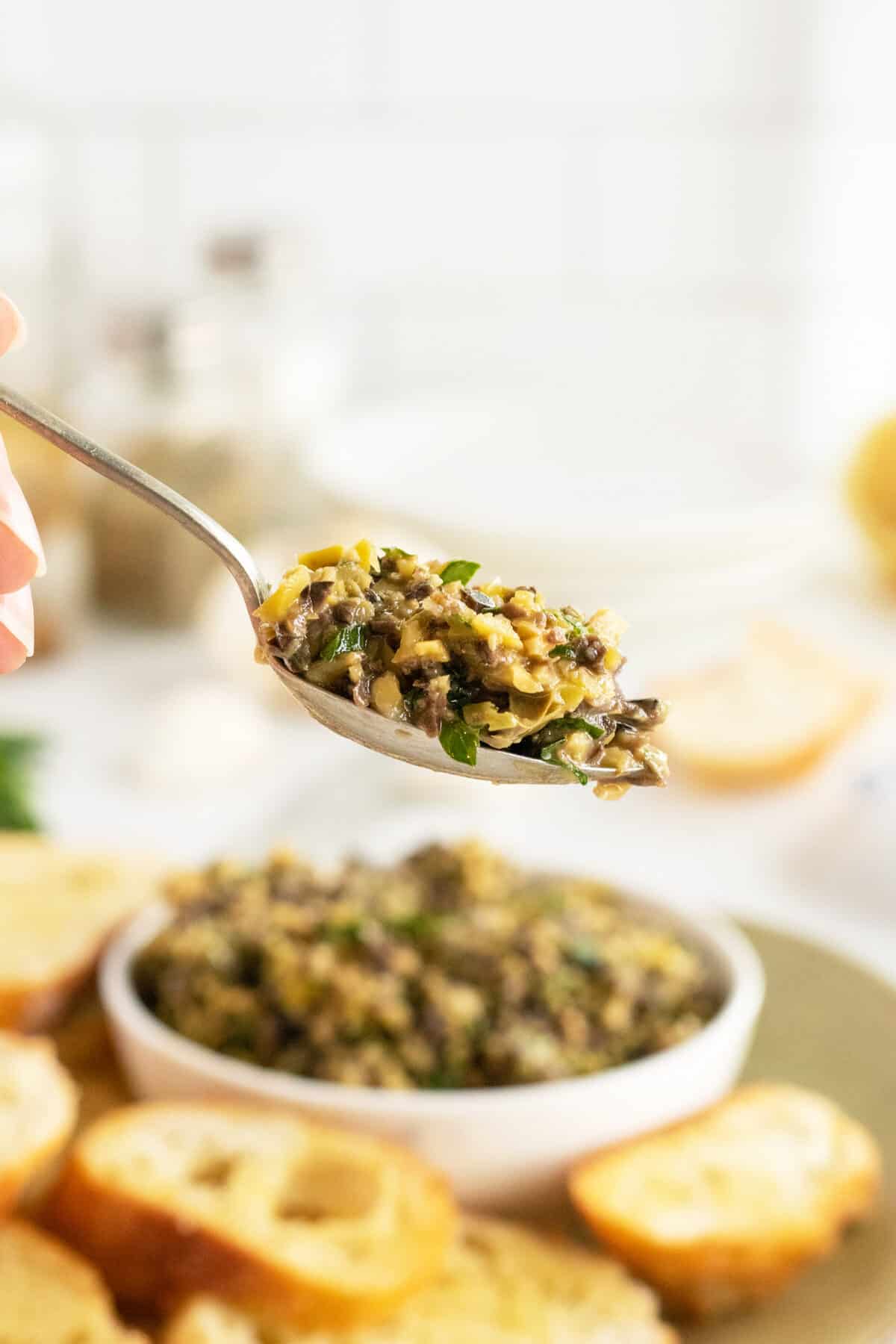 tapenade on a large spoon