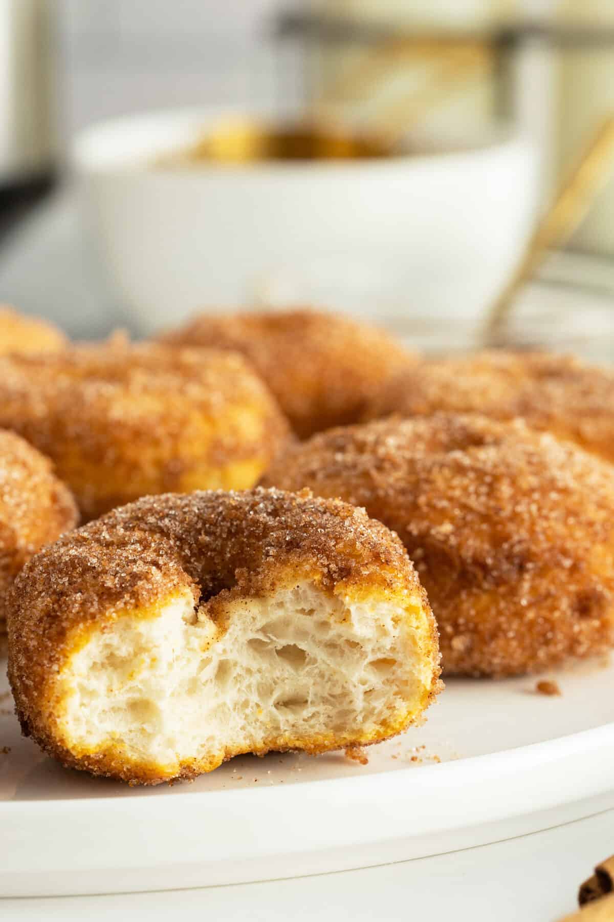 air fryer doughnut with a bite out of it 