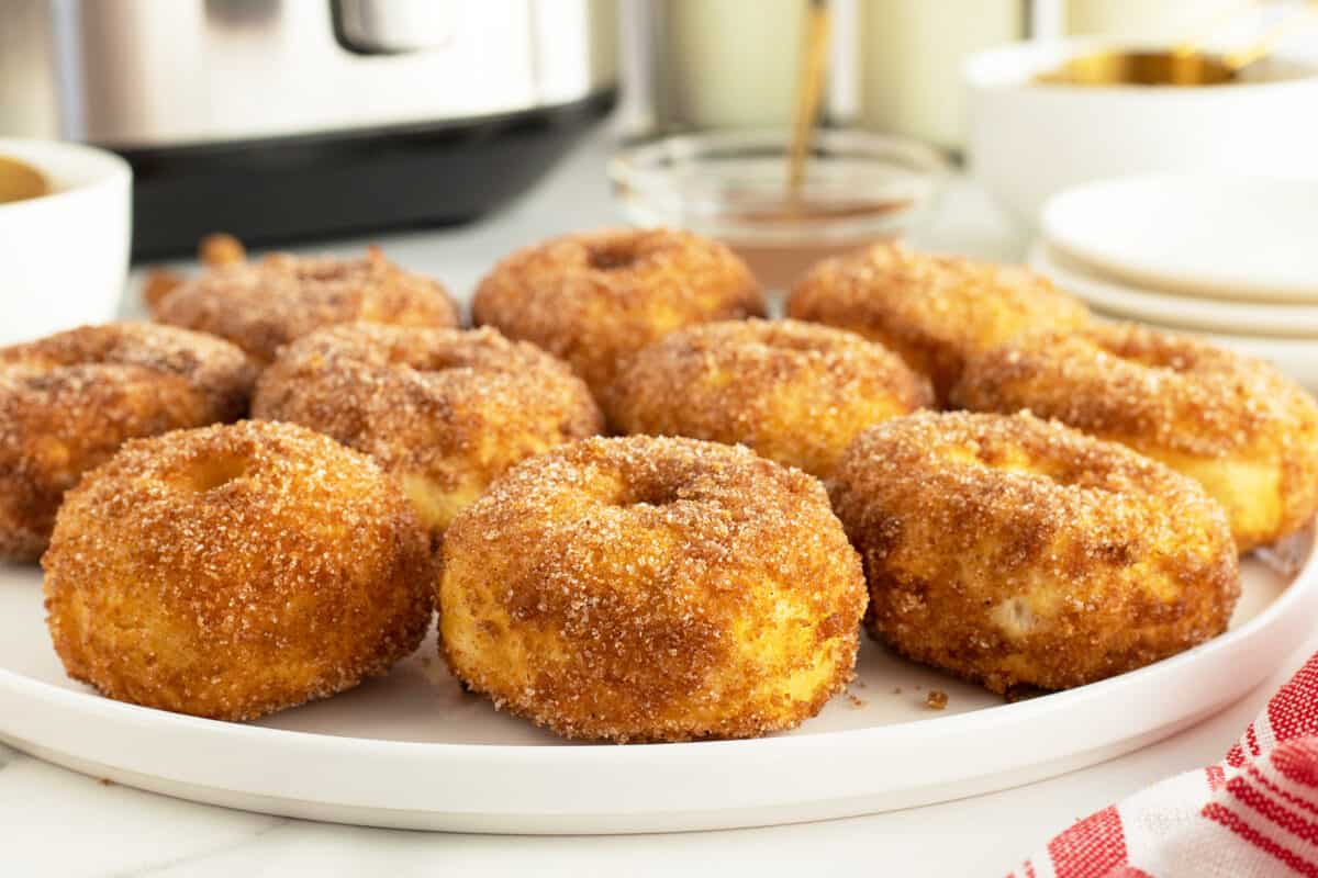 air fryer doughnuts on a large white plate