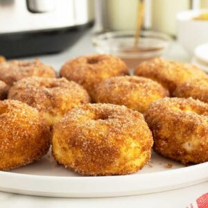 air fryer doughnuts on a large white plate