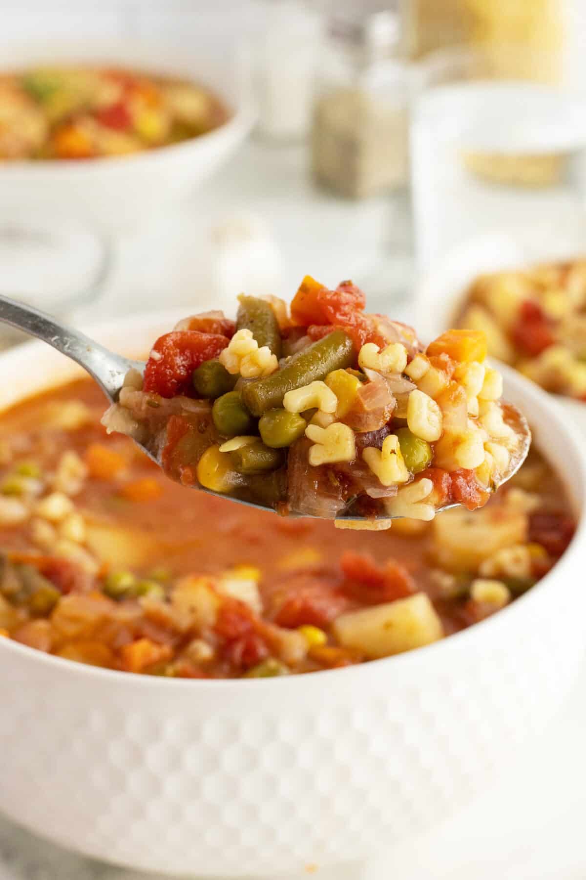 alphabet soup piled on a spoon