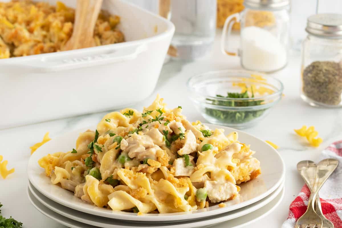 Creamy turkey casserole baked with pasta, vegetables, and golden cheese topping.