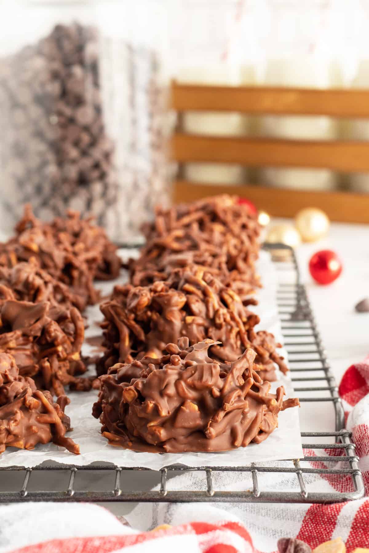 haystack cookies on a piece of parchment on a cooling rack