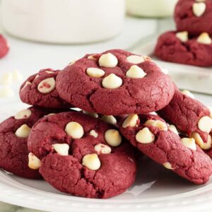 red velvet cookies with white chocolate chips on a white plate