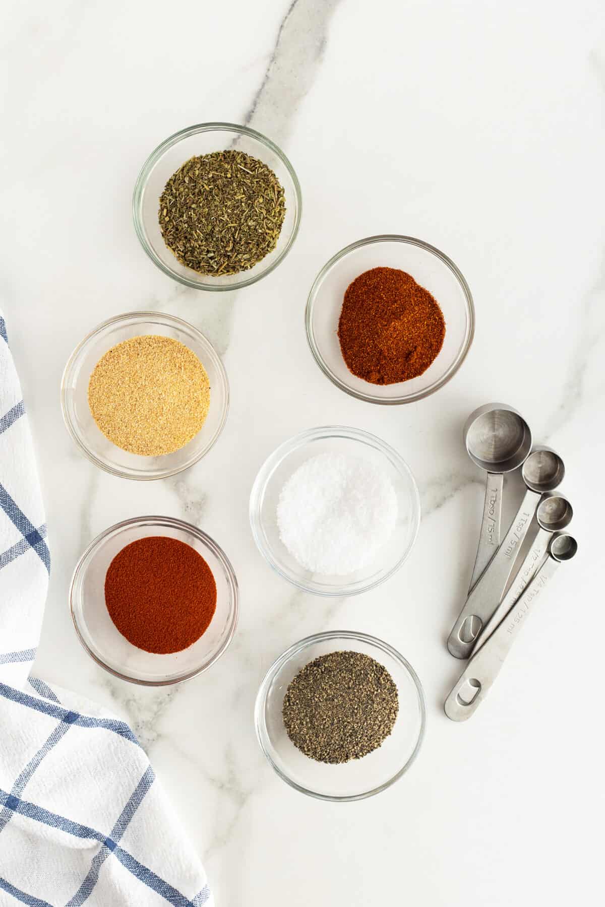 shrimp seasoning in small clear glass bowls