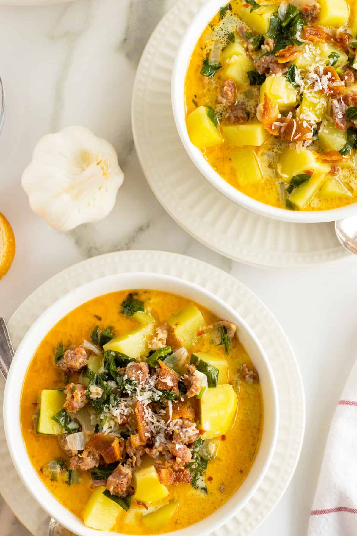 zuppa toscana in two white bowls