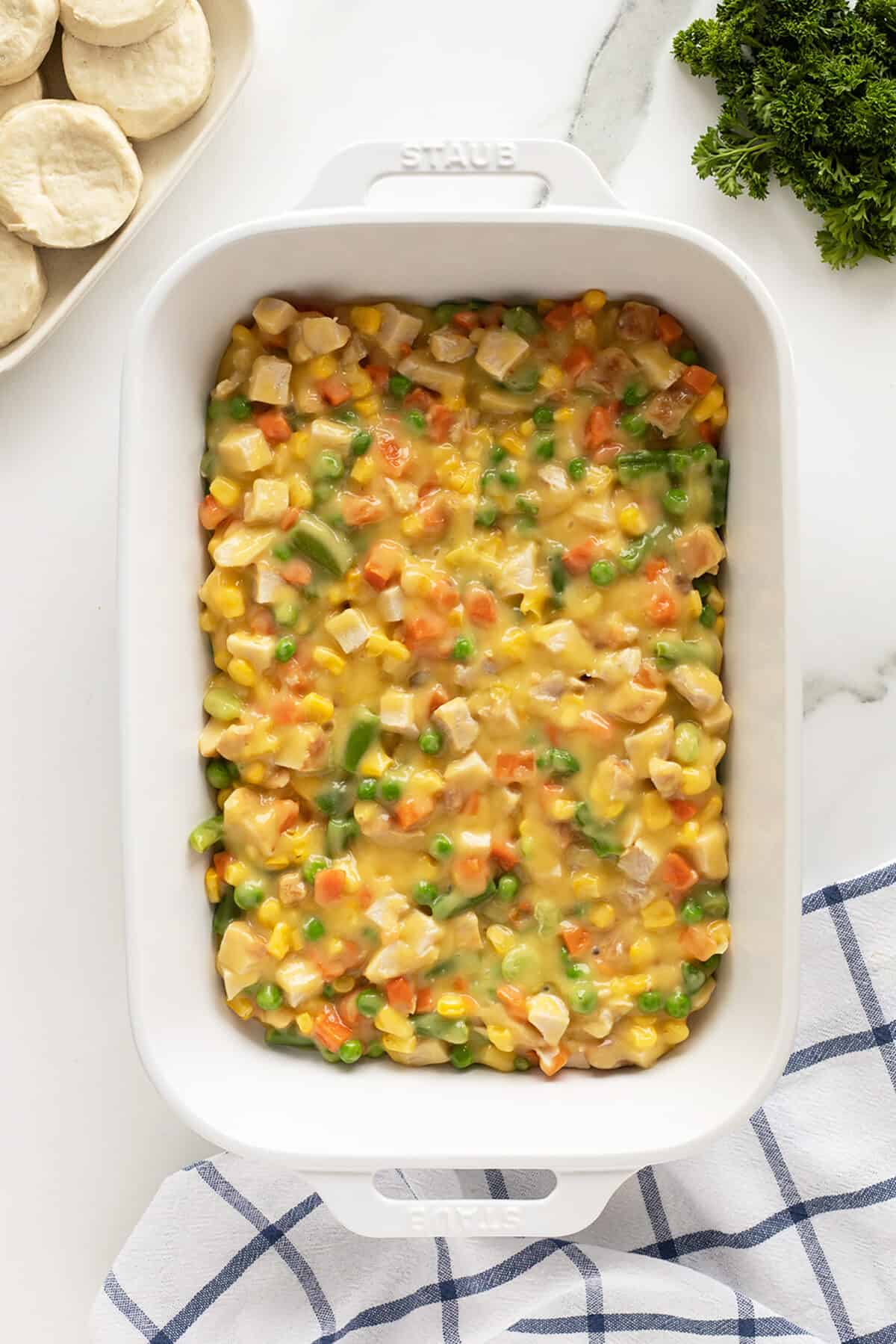 chicken pot pie casserole mix in the bottom of a baking pan