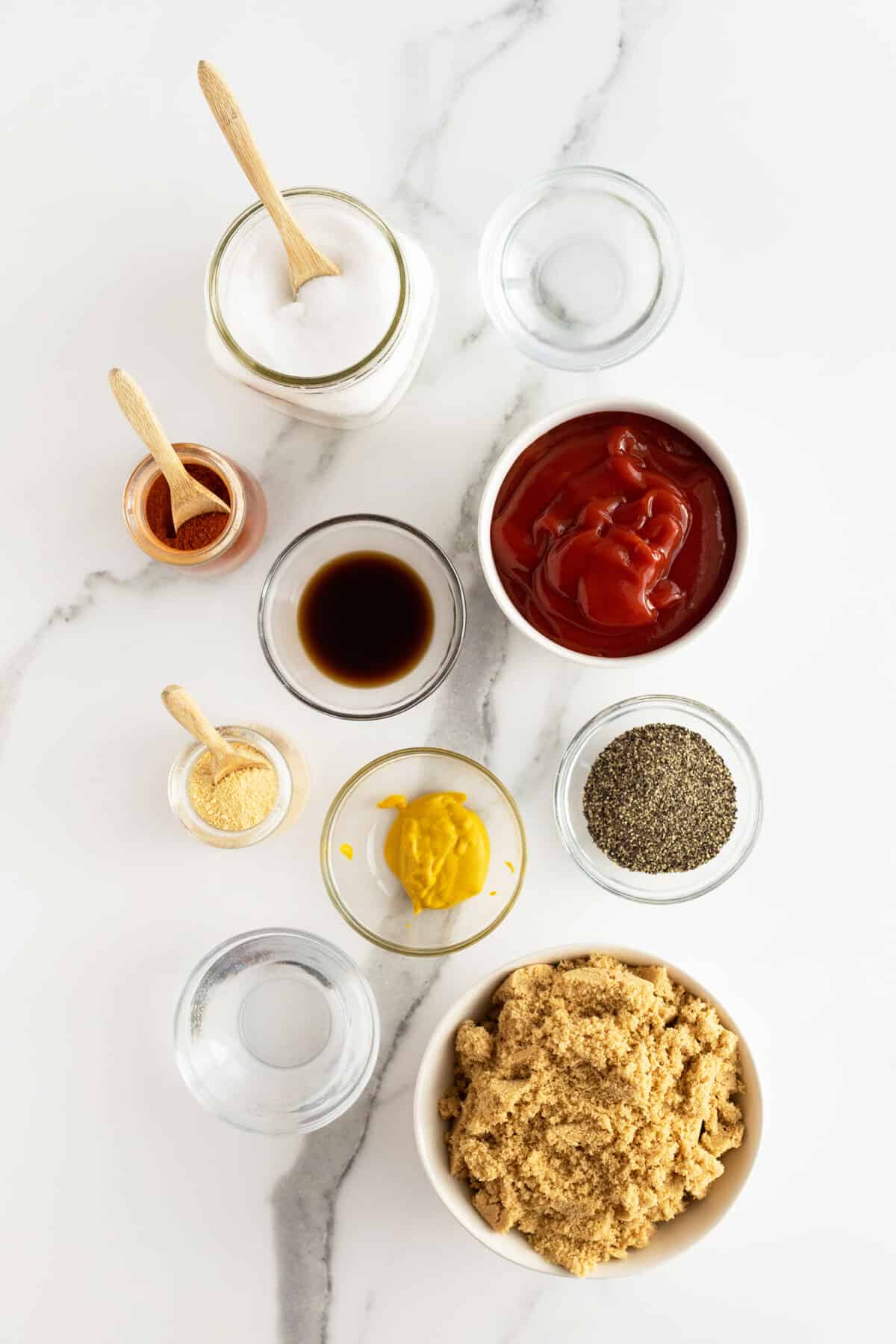 Homemade BBQ Sauce ingredients in small white and clear bowls