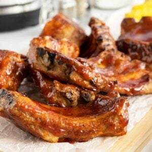 instant pot ribs sliced on a piece of parchment