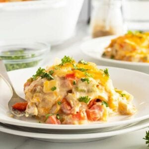 king ranch casserole on a white plate with a silver fork