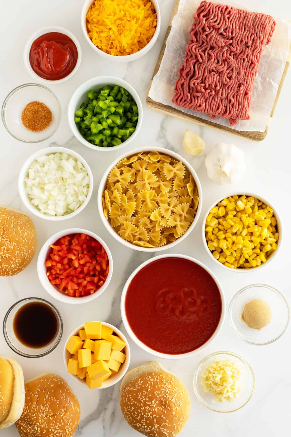 sloppy joe casserole ingredients in small bowls