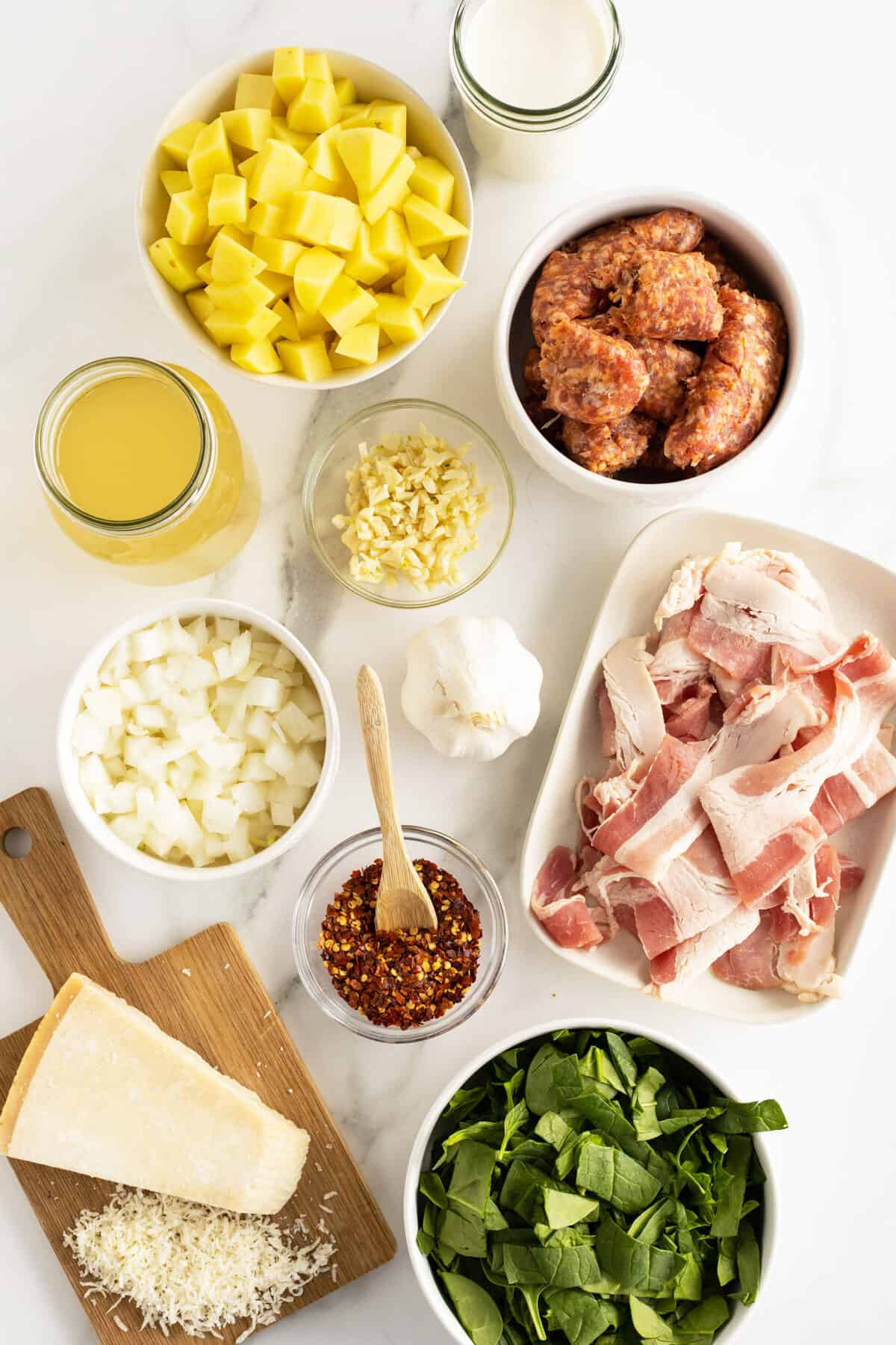 zuppa toscana ingredients in small bowls