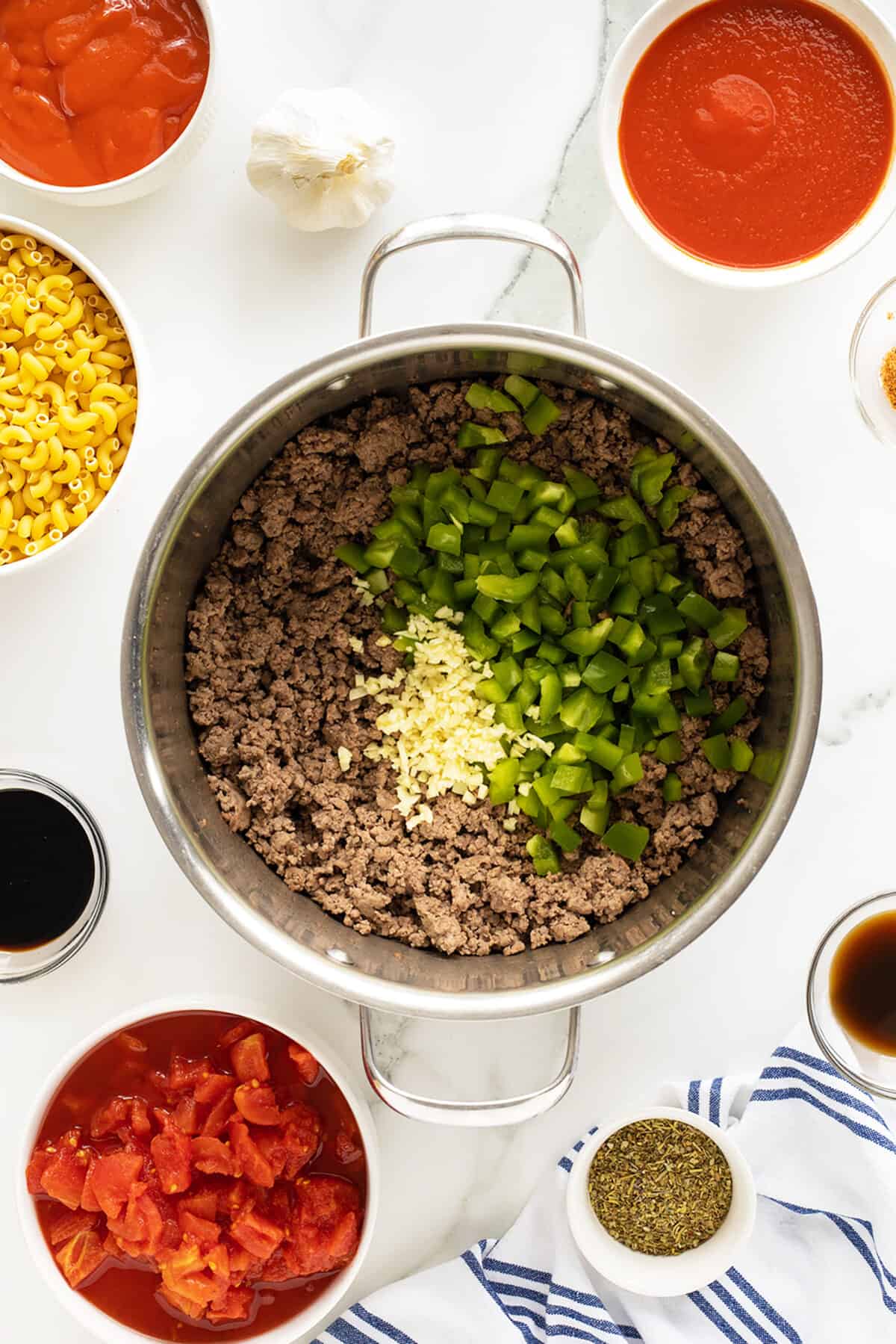 American chop suey ground beef in a pot with spices