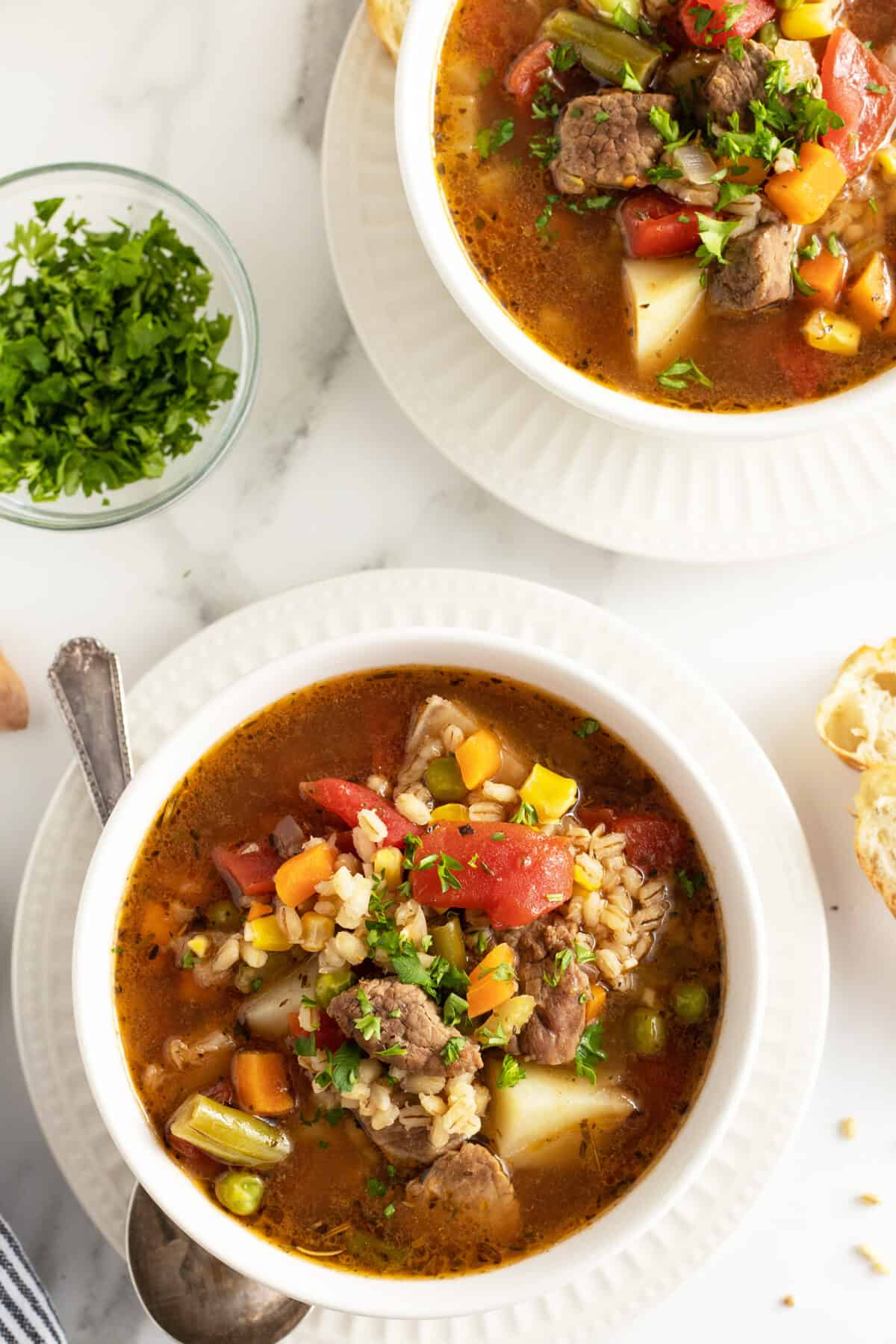 beef barley soup looking form overhead in two bowls