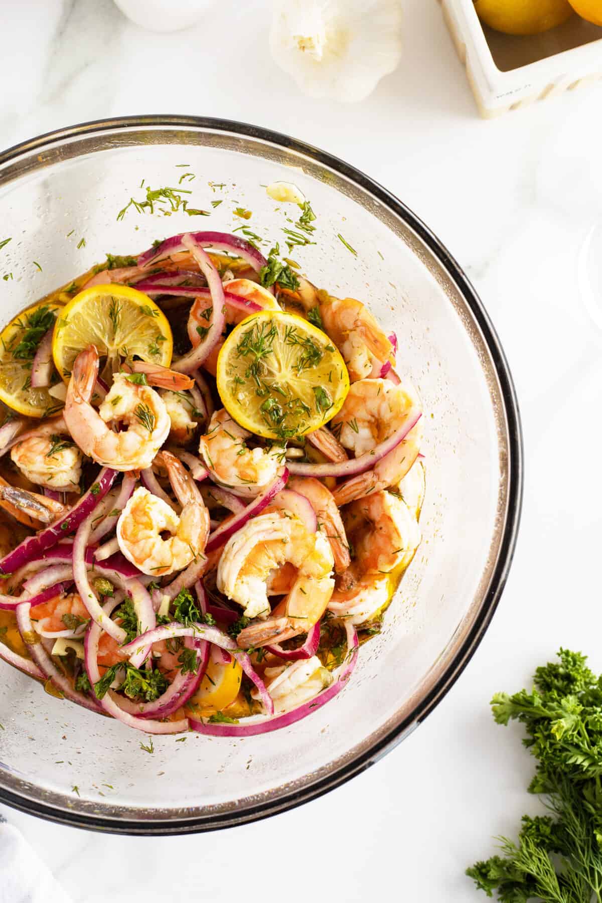 pickled shrimp in a large clear bowl