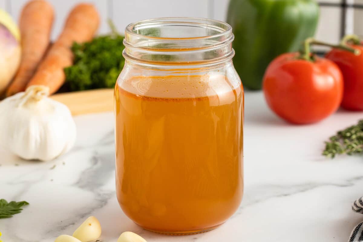 vegetable broth in a clear mason jar