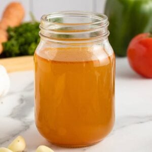 vegetable broth in a clear mason jar