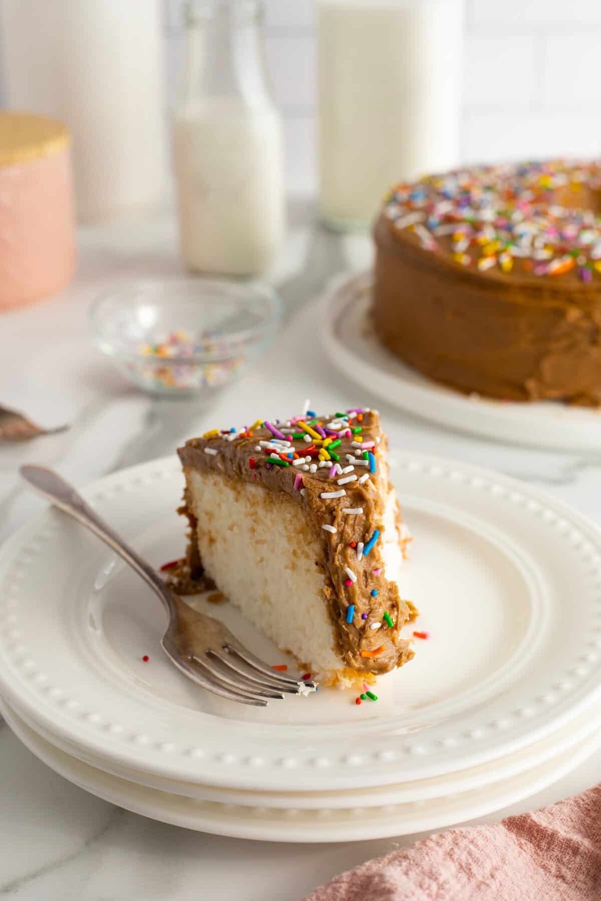slice of Angel cake that is frosted with chocolate icing