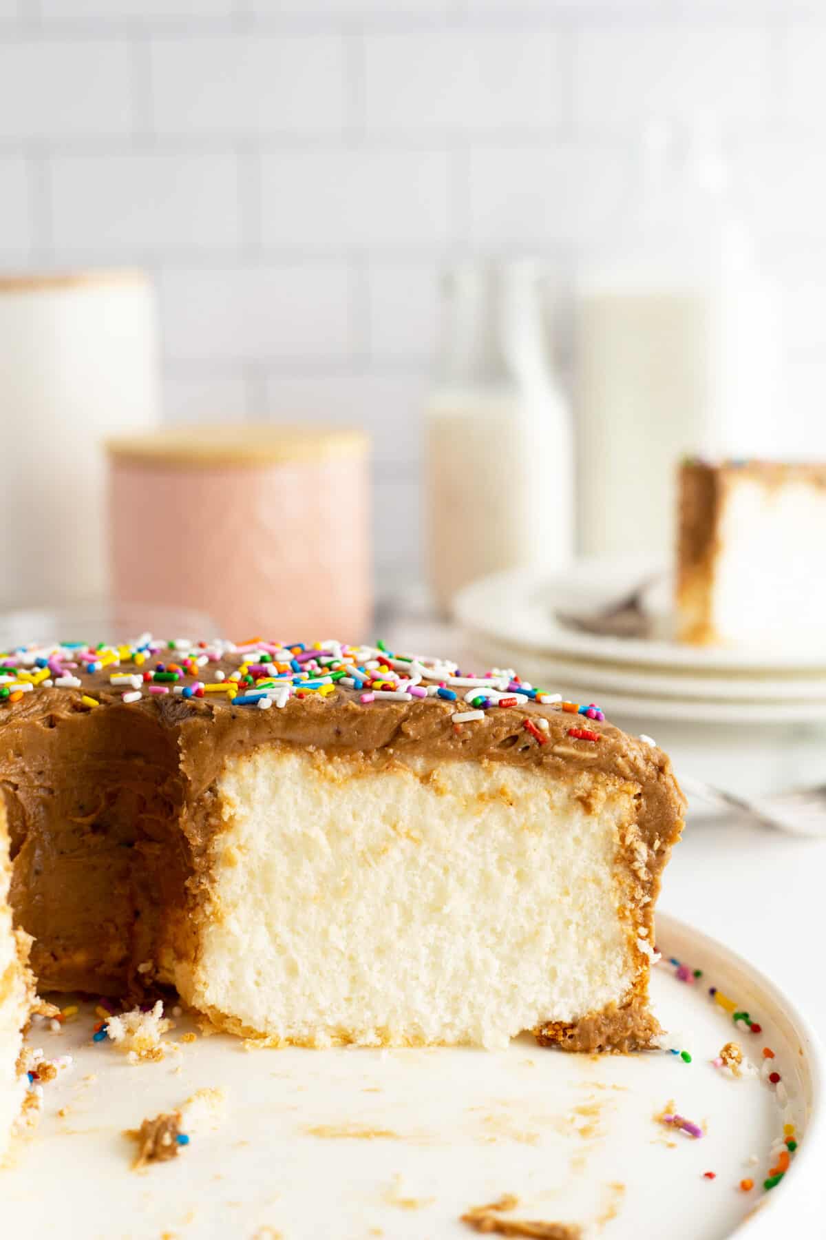 Angel cake with a slice out of it.