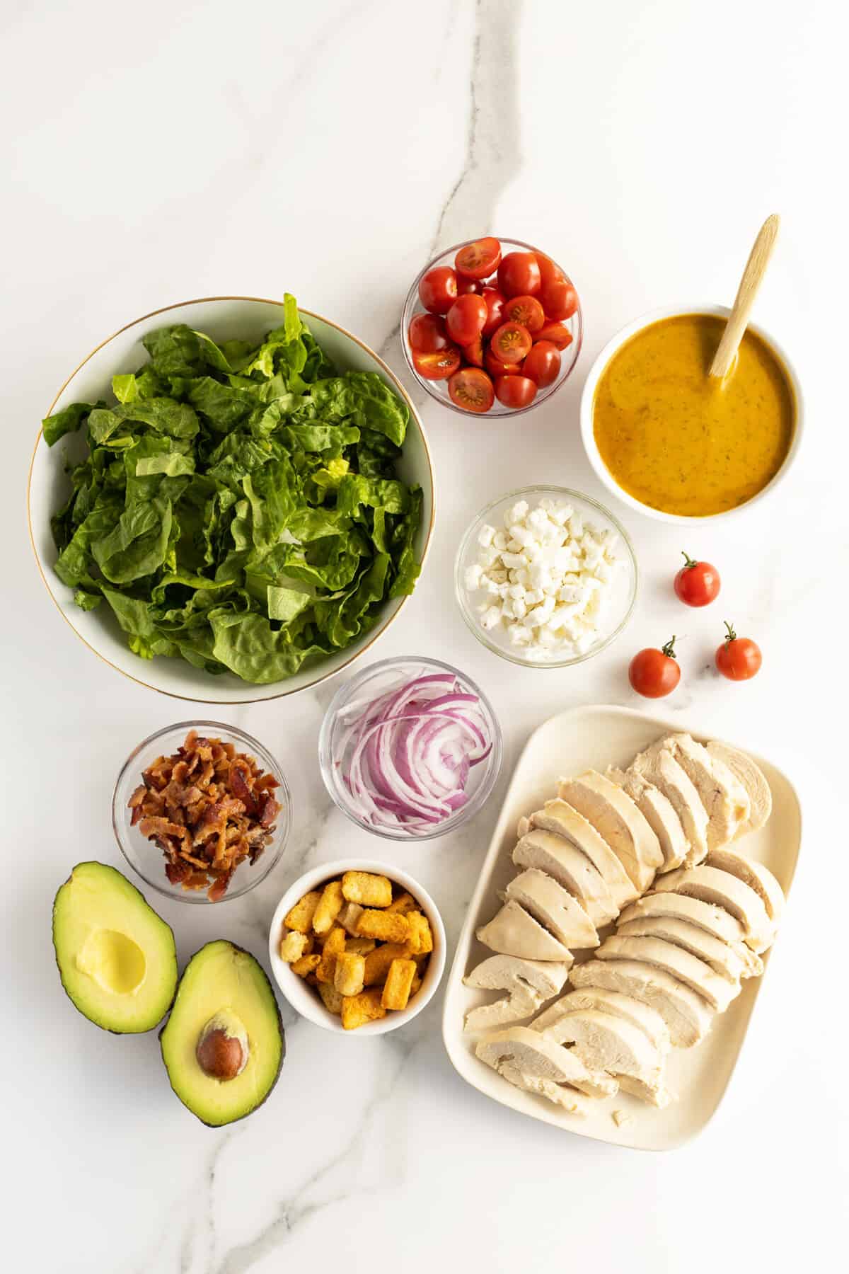 honey mustard chicken salad ingredients in small white bowls